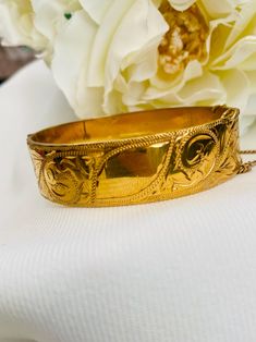 A great 9ct rolled gold vintage bangle. Looks amazing on. Comes in new bangle box as per photo 7 inch x 1.9 cm ** some wear dents to inside and a small mark on back top . Luxury Victorian Gold Bangle Bracelet, Luxury Antique Bangle Cuff Bracelet, Luxury Antique Filigree Bangle, Luxury Vintage Engraved Cuff Bracelet, Bangle Box, The Bangles, Vintage Bangles, Wedding Gift Baskets, Gold Bangle