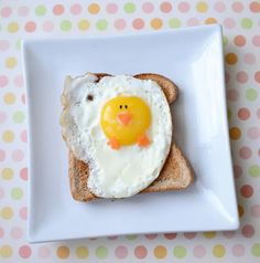 an egg in the shape of a chicken on toast