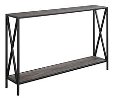 an iron and wood console table with two shelves on each side, against a white background