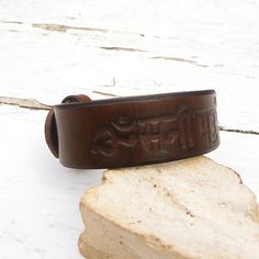 Mens leather bracelet Esoteric leather bracelet Buddhist Mantra, Men's Leather Bracelet, Buddhist Bracelet, Leather Cuff Bracelet, Cuff Watch, Cuff Jewelry, Craft Show Ideas, Veg Tan Leather, Mens Leather Bracelet