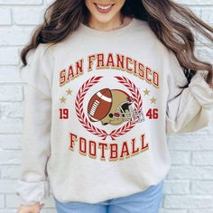 Show your San Francisco football pride with this vintage football sweatshirt! Perfect for game day or as a gift for him, this retro 1949 49ers sweatshirt is a must-have for any Bay Area fan. Hello there! 😊👋 If you're on the hunt for some seriously cozy sweatshirts, you've come to the right place! I'm absolutely passionate about what I do, and my mission is to make your shopping experience absolutely perfect. If you ever have any questions, concerns, or just want to chat about my products, feel Vintage Letter Print Sweatshirt For Fan Gear, Retro Sweatshirt For Fall Sports Events, Retro Sweatshirt For Sports Events In Fall, Vintage Sweatshirt For Sports Season Fan Merchandise, Vintage Sweatshirt For Sports Events In Fall, Vintage Letter Print Sweatshirt For Game Day, Retro Sweatshirt For Game Day, Retro Sweatshirt For Game Day And Sports Season, Retro Sweatshirt For Game Day, Sports Season