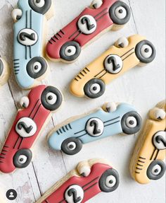 decorated cookies in the shape of race cars