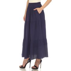 Elevate your fashion game with this flowy and effortlessly chic skirt. This maxi skirt from White Mark boasts a pleated design that adds texture, movement, and a touch of sophistication to your look. Dress it up or down as this skirt is incredibly versatile. Pair it with a tucked in blouse and heels for a sophisticated look or go for a more relaxed vibe with a tucked in tee and sandals and pair it with a jacket on chilly days. It’s perfect for various occasions and style preferences. Chic Solid Color Maxi Skirt With Lining, Chic Lined Maxi Skirt, Chic Flowy Full Skirt Bottoms, Chic Solid Color Gathered Maxi Skirt, Chic Flowy Rayon Maxi Skirt, Chic Tiered Maxi Skirt For Day Out, Chic Flowy Pleated Skirt, Flowy Long Pleated Skirt For Day Out, Elegant Pleated Flowy Maxi Skirt