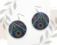 Original hand-painted earrings in this pattern made only once, very light to wear, colorful with a mandala motif, made with the intention of love. Made on a wooden disc (plywood). Diameter is 2 inches (5 cm), weigh 9 grams, painted with acrylic paints, painted dotart, protected by varnish. Stainless steel earwires. The back is black. I can make custom earrings in the colors you dream of with silver or gold-plated earwires (stainless steel). Who created them for you? My name is Karolina Kanimani, I follow the path of conscious development, I am passionate about nature and beauty and I LOVE to create. With joy and passion I create Mandalas from the Heart space, giving each an individual intention. I trained on courses to create Mandalas as a symbol of the Wheel of Life. I invite you to my In Multicolor Peacock Design Earrings As Gift, Multicolor Peacock Design Earrings For Gift, Hand Painted Multicolor Circular Jewelry, Hand Painted Round Jewelry For Festivals, Multicolor Hand Painted Jewelry For Festivals, Bohemian Hand Painted Round Jewelry, Mandala Pendant, Mandala Jewelry, Easy Love Drawings