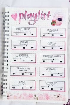 a planner with pink flowers and words on it that says playlist from dress up