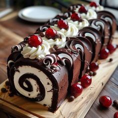 a chocolate cake with white frosting and cherries