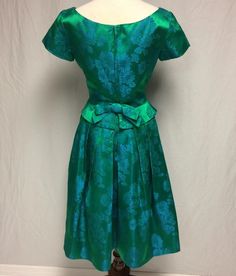 1950's Green/blue Satin Damask Dress RAPPI Peplum - Etsy Green Pleated Bodice Cocktail Dress, Green Pleated Bodice Satin Dress, Green Satin Dress With Pleated Bodice, 1950s Style Green A-line Dress, Fitted Green Tea-length Dress, Green Silk Dress With Pleated Bodice, Green Satin Dress For Garden Party, Retro Green Evening Dress, Green Retro Evening Dress