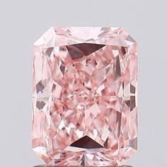 a fancy pink diamond is on display