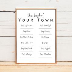 the best of your town printable wedding seating chart is displayed on a wooden table