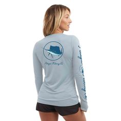 a woman wearing a long sleeve shirt with the words, happy family beach on it