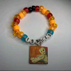 a bracelet with an image of a cat and the words i'm sures on it