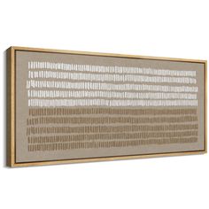 a beige and white wall hanging on the side of a wooden framed art piece with lines drawn