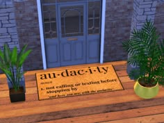 a welcome mat sitting on top of a wooden table next to a potted plant