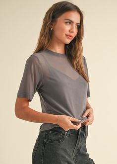 93% polyester // 7% spandex
Grey mesh t-shirt
Semi sheer
Crew neckline
Short sleeve
Loose fit
Hand wash cold
Imported garment
Model is wearing a small
T4295 Cheap Boxy Fit T-shirt For Spring, Short Sleeve Mesh Top, Mesh T Shirt, Jumpsuit Shorts Rompers, Crop Top Blouse, Denim Flares, Fall Shopping, Cardigan Jacket, Gray Tshirt