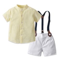 A handsome cotton shorts set includes white cotton shorts and suspender braces with black and brown detail. The fresh pin striped, seersucker, grandfather collar shirt completes the set. Shirt available in Lemon and Sky Blue Material: CottonAge Range: 12 Months- 6 YearsCollar: Mandarin CollarItem Type: Shirt Shorts SetFit: Fits true to size, take your normal sizePattern Type: Pin Striped Plaid Outerwear, Gentleman Suit, Girls Tutu Dresses, Bowtie And Suspenders, Boys Fits, Kids Clothes Boys, Tutus For Girls, Striped Sleeve