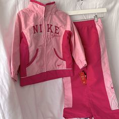 Brand New Pink Winter Sports Sets, Playful Pink Nike Sets, Girls Nike Outfits, Nike Galaxy, Cute Pink Outfits, Nike Sweatsuit, Bodysuit With Shorts, Kids Athletic, Neon Outfits