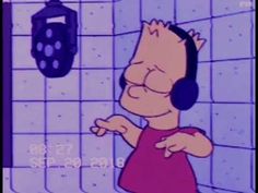 a cartoon character wearing headphones in front of a tiled wall with a hand dryer hanging on it