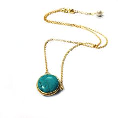 Coin Turquoise Necklace in Silver or Gold This Necklace is hand crafted with pure and sterling silver. The gold color is done by coating silver with 18 karat gold. The length of the necklace is Approximately 15.7 inches (40cm) witha- an adjustable end and a pearl that dangles at the back. I ship my items well-cushioned, inside a bubble mailer in organze gift pouches or gift boxes, prettily packaged and perfect for giving. I also include a zipped bag for you so that you can safely store your jewe Elegant Turquoise Necklace With Natural Stones, Handmade Dainty Gold Turquoise Necklace, Handmade Elegant Round Turquoise Necklace, Elegant Handmade Round Turquoise Necklace, Dainty Handmade Gold Turquoise Necklace, Elegant Round Handmade Turquoise Necklace, Elegant Round Turquoise Handmade Necklace, Turquoise Necklace With Round Natural Stone Pendant, Gold Turquoise Pendant Necklace With Gemstone