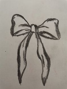 a drawing of a bow on a piece of paper