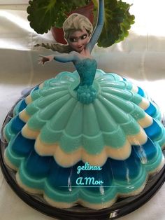 there is a cake that has been decorated like a ballerina on top of it