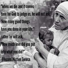 a nun holding a child in her arms with a quote from mother teresa on it