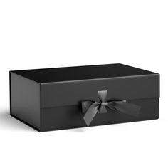 a black box with a silver bow on it