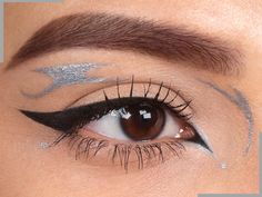 SILVER PEARL is a light silver eyeliner with a pearlescent finish. Comes with a FREE eyeliner brush!  NEW! Our water activated eyeliners are so easy to use and will last forever! Simply put a drop of water. Swirl brush around to make it paste, then apply! Can also be used for eyeshadow art and body paints. Comes with a free eyeliner brush! Mineral eyeliners are made from pigments straight from Mother Earth's finest ingredients. No harsh chemicals, synthetic dyes, preservatives, fragrances, dyes, Makeup Silver Eyeliner, Hooded Eye Silver Makeup, Colorful Graphic Liner, Easy Graphic Eyeliner, Grafik Eyeliner, Water Activated Eyeliner, Graphic Liners, Eyeshadow Art, Creative Eyeliner