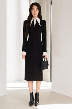 This dress adds an elegant twist to your wardrobe! Softly tailored with a fitted waist, long poet sleeves, and a midi length hem, it offers a timelessly chic silhouette. Wear it with confidence for any special occasion. Formal Long Sleeve Bodycon Dress, Formal Long Sleeve Evening Dress, Elegant Bishop Sleeve Dress For Work, Elegant Long Sleeve Dress With Bishop Sleeves For Spring, Elegant Long Sleeve Winter Dress, Elegant Bishop Sleeve Winter Dress, Chic Long Sleeve Dress With Bishop Sleeves For Fall, Winter Bishop Sleeve Elegant Dress, Fitted Long Sleeve Dress For Formal Winter Events