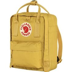 Keep your little adventurer exploring with their gear on their back in the Fjallraven Kanken Mini 7L Backpack. Crafted from tough Vinylon F, this little knapsack defends against dirt and stains, and its miniature compartment is just right for an extra jacket and gloves should the weather change. A zippered front pocket is perfect for snacks in case they get hungry, and the handles at the top allow it to convert into a side bag if you want to borrow it for the day. Durable Backpack For Camping, Durable Standard Backpack For Camping, Practical Backpack For Hiking And School, Outdoor Nylon Backpack With Logo Patch, Practical Backpack With Adjustable Strap For Outdoor Activities, Practical Backpack For Outdoor Activities With Adjustable Strap, Practical Backpack With Adjustable Strap For Outdoor, Backpack With Logo Patch For Outdoor Activities, Sporty Standard Backpack For Camping