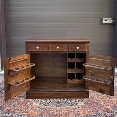 A late 20th century Ethan Allen Antiqued Pine Custom Room Plan collection Rustic Traditional bar cabinet featuring one felt-lined drawer with removable partitions and a locking shutter door cabinet with four glass racks and a wine rack. Includes the original key. The top is solid pine. American made. Circa 1980.  Ethan Allen Model # 12-4034 (Refreshment Cabinet Base) Ethan Allen Finish # 212 Ethan Allen Old Tavern Pine Furniture, Ethan Allen Living Room Ideas, Ethan Allen Living Room, Traditional Bar, Navy Blue Bedrooms, Cabinet Base, Door Bar, Dry Bars, Rustic Traditional