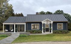 this is an artist's rendering of a small blue house with porches and windows