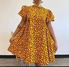 This beautiful dress is made with best quality ankara fabric. It is suitable for any kind of ceremony and outings. It is available in different sizes and prints. It can be adjusted according to buyer's choice. For more details, please feel free to start a conversation with me. Ankara Free Dresses For Women, Floral Print Ankara Fabric Dress, Fitted Short Sleeve Mini Dress In Ankara Fabric, Fitted Short Sleeve Ankara Mini Dress, Ankara Circle Dress, Short Ankara Dresses Classy, Short Ankara Dress, Short Ankara Dresses, Dress African