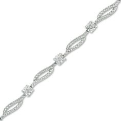 Make an elegant statement with this darling diamond fashion bracelet. Expertly crafted in sleek sterling silver, this bracelet features twisting textured ribbons separated by shimmering diamond accent stations. A lovely look anytime, this 7.25-inch bracelet is finished with a bright polished shine and secures with a durable lobster claw clasp. Diamond Fashion, Diamond Bracelets, White Metal, Diamond Clarity, Diamond Stone, Christmas Sale, Bracelet Designs, Lobster Claw, Sterling Silver Bracelets