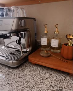 an espresso machine sitting on top of a counter