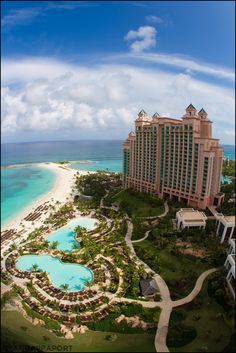 an aerial view of the beach and hotels in front of the ocean with text that reads, atlantics - the beautiful bananas see more