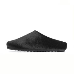 ‘The Pony Clog’ by ROAM is made from sleek faux calf hair and lined in ultra-soft and breathable cotton fleece that rests gently against the skin. Memory foam has been inserted by hand into the upper, making these extra comfortable, and allowing them to mold to your foot for a perfectly cushioned and supportive fit. RO Calf Hair, Cotton Fleece, Clogs, Memory Foam, Skin, Black