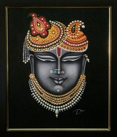 a painting of a woman's face with pearls and jewels on her head, in a black frame