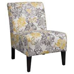 an upholstered chair with yellow and gray flowers