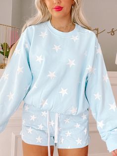 undefined Star Print Long Sleeve Sleepwear For Loungewear, Casual Star Print Sweatshirt For Loungewear, Cute Cotton Sweatshirt For Loungewear, Relaxed Fit Star Print Top For Loungewear, Star Print Relaxed Fit Top For Loungewear, Trendy Cotton Sweatshirt For Lounging, Trendy Cotton Lounging Sweatshirt, Star Print Long Sleeve Sleepwear For Pajama Party, Cozy Blue Crew Neck Sweatshirt