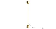 a gold colored floor lamp with a black cord attached to the base and a white background