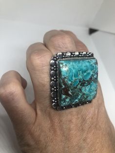 Large genuine blue Turquoise Vintage ring Low content silver not sterling. Size 10 Can be re sized at my jeweler. $10-$20 All rings are shipped free in the US in a nice gift box. Check out our over a THOUSAND great reviews Engraving is $4 per letter and is not always perfect depending on the piece. It can take a few days if the jeweler is busy. This is payable to Paypal Judithsltd@gmail.com Artisan Turquoise Rectangular Jewelry, Southwestern Style Adjustable Rectangular Jewelry, Southwestern Turquoise Jewelry For Anniversary, Collectible Turquoise Jewelry With Large Stone, Rectangular Turquoise Jewelry For Collectors, Unique Turquoise Ring Jewelry, Turquoise Open Ring With Large Stone, Nickel-free Turquoise Jewelry For Anniversary, Collectible Rectangular Turquoise Jewelry