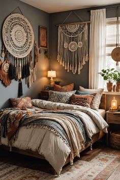 a bed room with a neatly made bed and hanging decorations on the wall above it