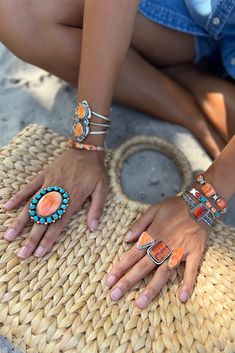 This Red Spiny Shell Cuff features a single rectangular cabochon set in a smooth oxidized bezel. The cuff is constructed with four sterling silver twists for a one-of-a-kind design. This is a stunning example of modern Navajo jewelry. Spiny Shell is found deep in the Sea of Cortez in the Baja region of the Gulf of California. The color of the shell depends on the depth of the water with the darkest colors in the deepest water. Hallmarked "NZ" Stamped "STERLING" Measurements: 5 1/4" x 1 1/4" (Ope Vintage Navajo Jewelry Stone, Unique Orange Bangle Jewelry, Bohemian Hand Wrapped Rectangular Jewelry, Hand Wrapped Rectangular Bohemian Jewelry, Southwestern Style Adjustable Rectangular Jewelry, Adjustable Orange Cabochon Jewelry, Bohemian Jewelry With Rectangular Gemstone, Bohemian Rectangular Gemstone Jewelry, Orange Bohemian Jewelry With Cabochon