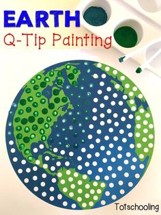 the earth q - tip painting book is on display