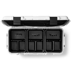 an open plastic case with four compartments