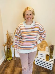 Wrap yourself in cozy comfort with our Oversized Striped Fall Sweater! This dreamy piece features a playful mix of pinks, blues, oranges, and cream, creating the perfect blend of vibrant and soft hues. Its oversized fit is all about relaxed vibes, making it ideal for layering on those chilly days. Whether you're heading out for a coffee run or snuggling up at home, this sweater is your go-to for effortless style and warmth. Pair it with your favorite jeans or leggings for an easy, laid-back look that's anything but basic. Brand: ModDescription: Oversized cozy striped sweater with pinks, blues, oranges and creamFit Info: Oversized, Whitney is wearing a smallLength: The length hits below the hipsBust: The bust is true to sizeWaist: The waist is true is sizeHips: The hips are true to sizeFabr Blue Cable Knit Sweater, Coffee Run, Funny Fashion, Fall Sweater, Cute Boots, Fall Sweaters, Comforters Cozy, Striped Sweater, Cozy Fall