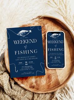 the weekend of fishing is on display in front of a wooden plate with a phone