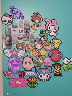 a bunch of stickers that are on the side of a wall in a room