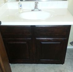 a bathroom with a sink and mirror in it