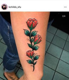 a woman's leg with a flower tattoo on her left arm and the words,